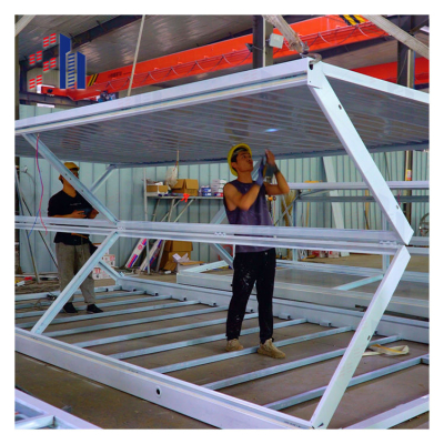 Casa contenedor de paquete plano