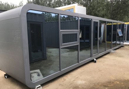Tấm trang trí kim loại gợn sóng màu xám đậm cho việc cải tạo ngoại thất cabin Apple